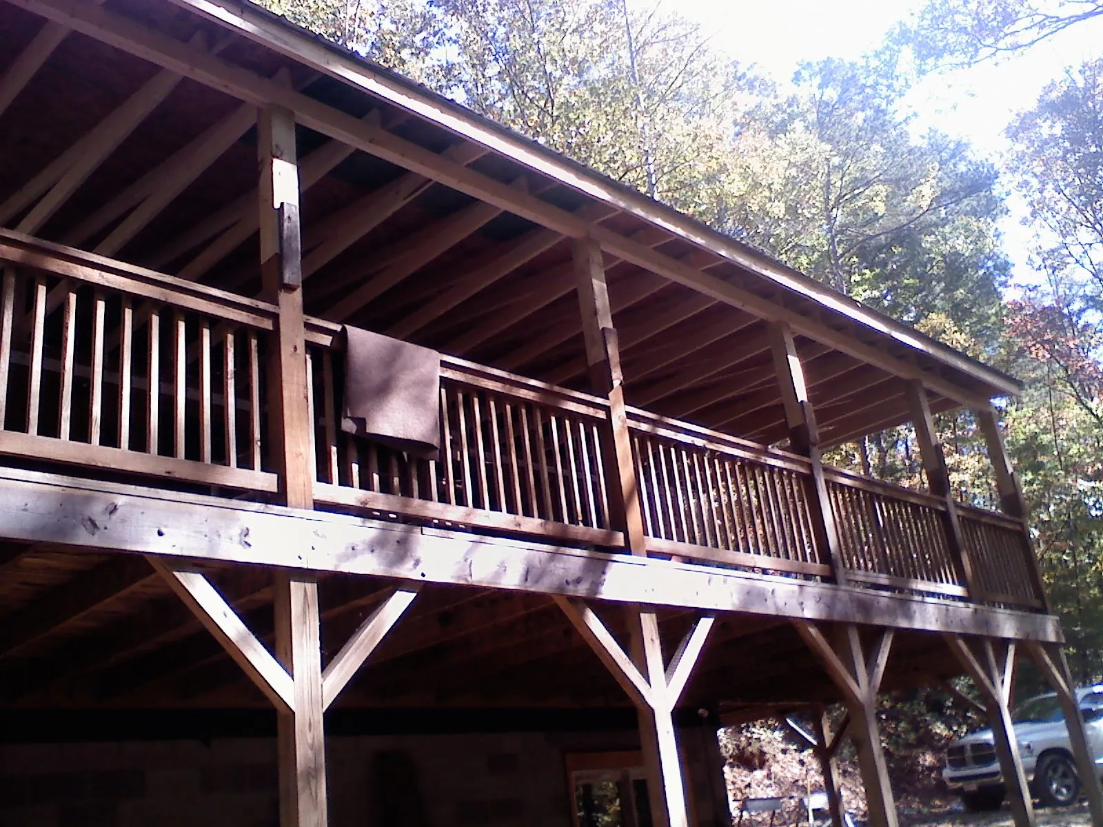 Timber framing under a new elevated porch and deck — Roof Leak Repair in Mount Victory by Roofing Brothers